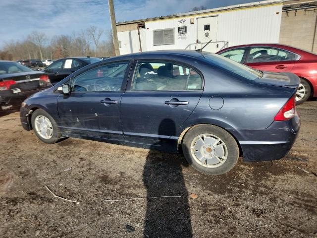 Photo 2 from auction – 2010 HONDA CIVIC HYBR with VIN JHMFA3F21AS000532