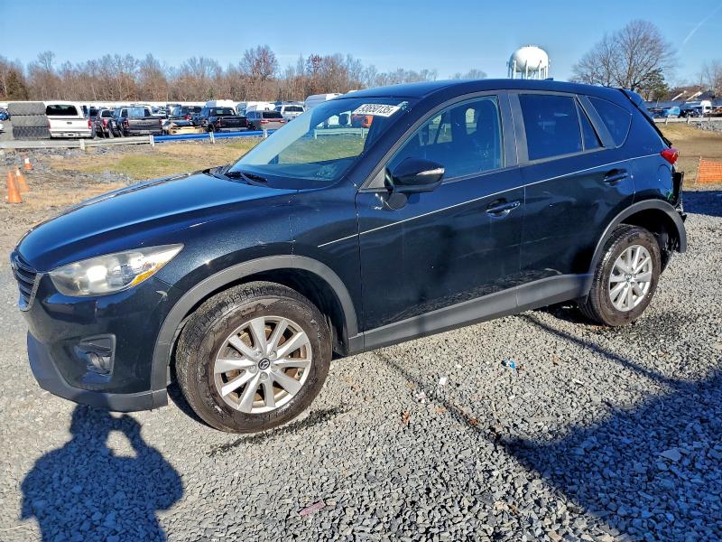 MAZDA CX-5 TOURI 2016 with VIN JM3KE4CYXG0745018 - Photo from auction