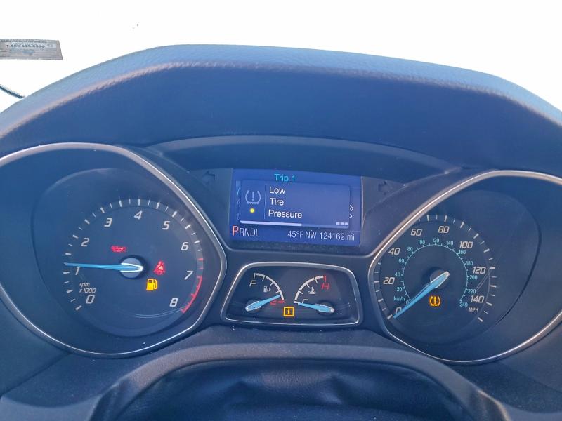 Photo 9 from auction – 2013 FORD FOCUS with VIN 1FADP3F2XDL219954