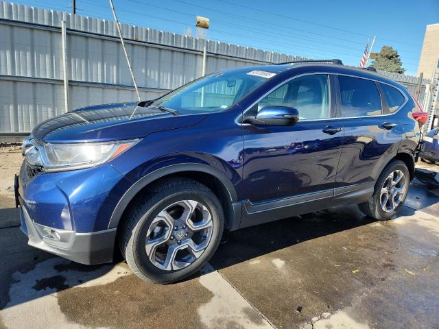 Photo 1 from auction – 2018 HONDA CR-V EX with VIN 7FARW2H57JE089588