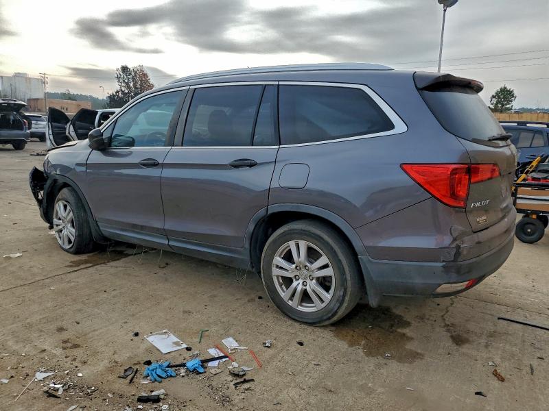Photo 2 from auction – 2016 HONDA PILOT LX with VIN 5FNYF5H13GB019603