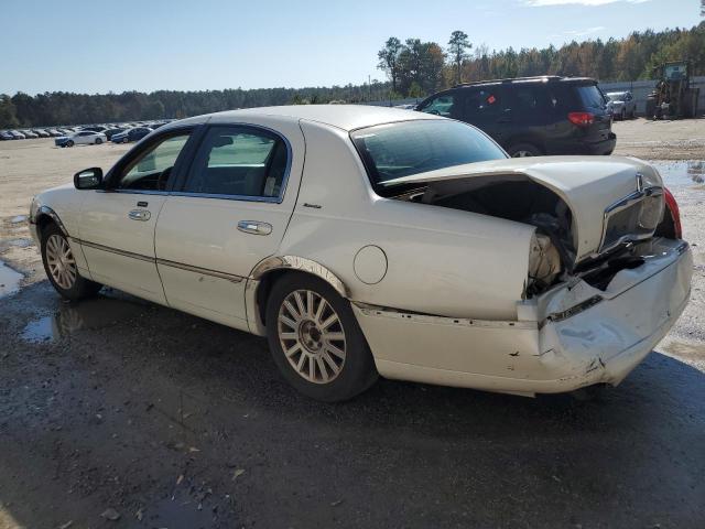Photo 2 from auction – 2003 LINCOLN TOWN CAR E with VIN 1LNHM81W73Y658246