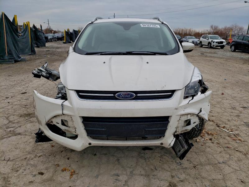 Photo 5 from auction – 2016 FORD ESCAPE TIT with VIN 1FMCU0J98GUC76469