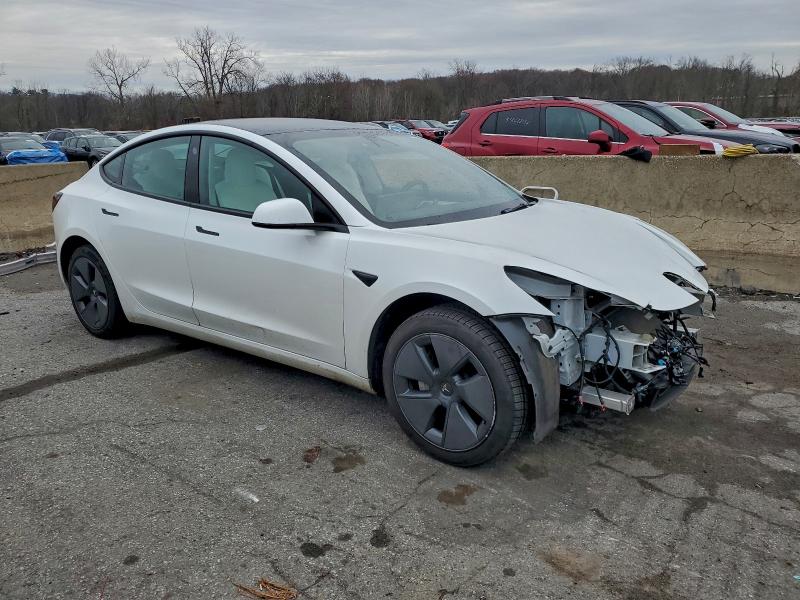 Photo 4 from auction – 2022 TESLA MODEL 3 with VIN 5YJ3E1EB2NF275330