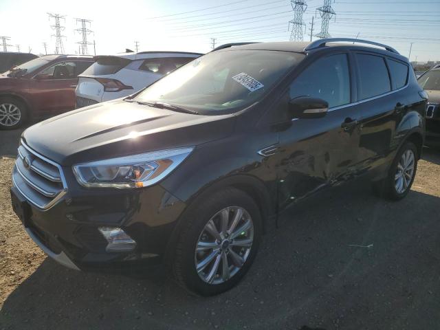 FORD ESCAPE TIT 2017 with VIN 1FMCU0JD6HUA80424 - Photo from auction