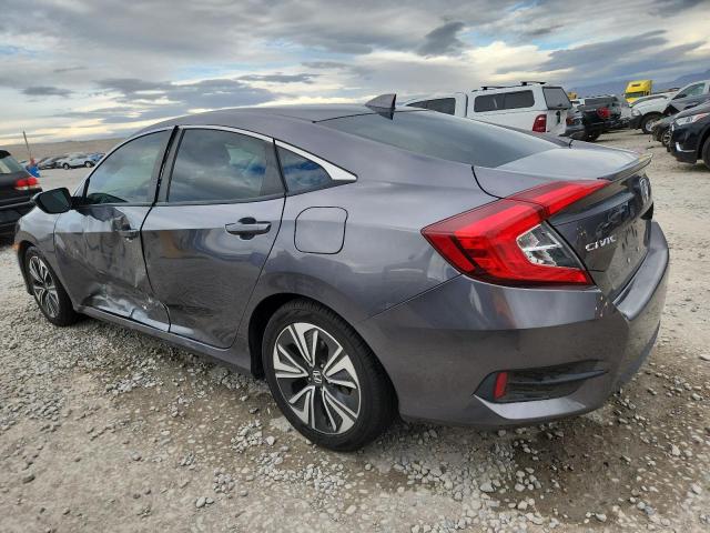 Photo 2 from auction – 2018 HONDA CIVIC EX with VIN JHMFC1F38JX004622