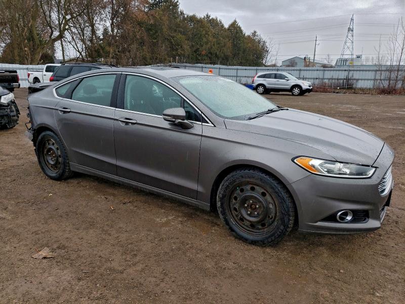 Photo 4 from auction – 2013 FORD FUSION TIT with VIN 3FA6P0D91DR333009