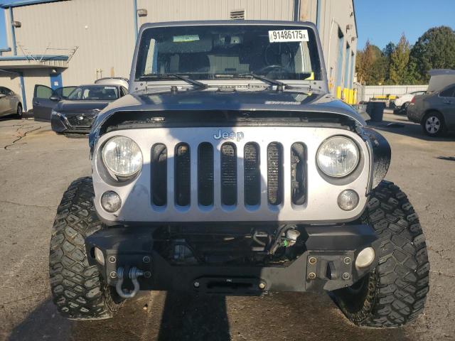 Photo 5 from auction – 2016 JEEP WRANGLER U with VIN 1C4BJWFG2GL236672