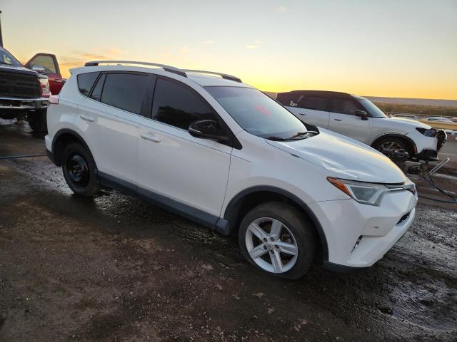 Photo 4 from auction – 2016 TOYOTA RAV4 XLE with VIN 2T3RFREV6GW463460