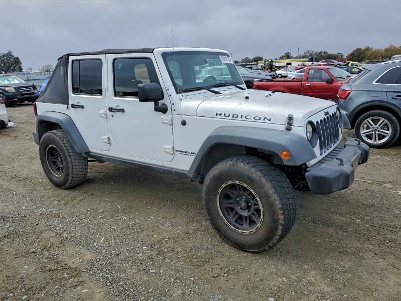 Photo 4 from auction – 2011 JEEP WRANGLER U with VIN 1J4BA6H15BL632803