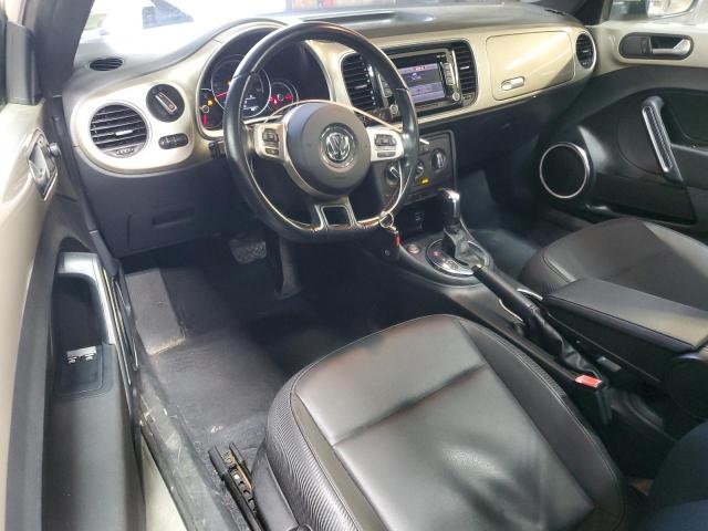 Photo 8 from auction – 2013 VOLKSWAGEN BEETLE with VIN 3VWJX7AT3DM667646