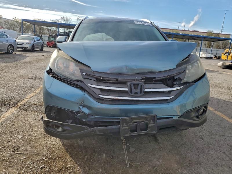 Photo 5 from auction – 2014 HONDA CR-V EXL with VIN 2HKRM3H74EH533154