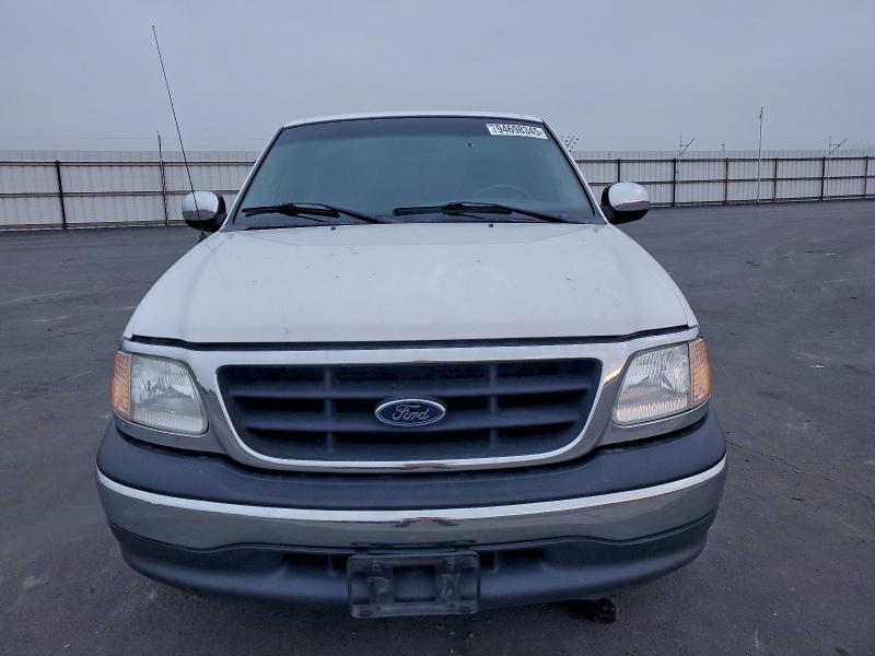 Photo 5 from auction – 2001 FORD F150 with VIN 1FTRF17W61NA90202