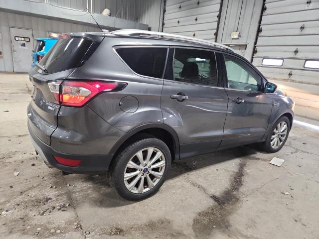 Photo 3 from auction – 2017 FORD ESCAPE TIT with VIN 1FMCU9J92HUD36414