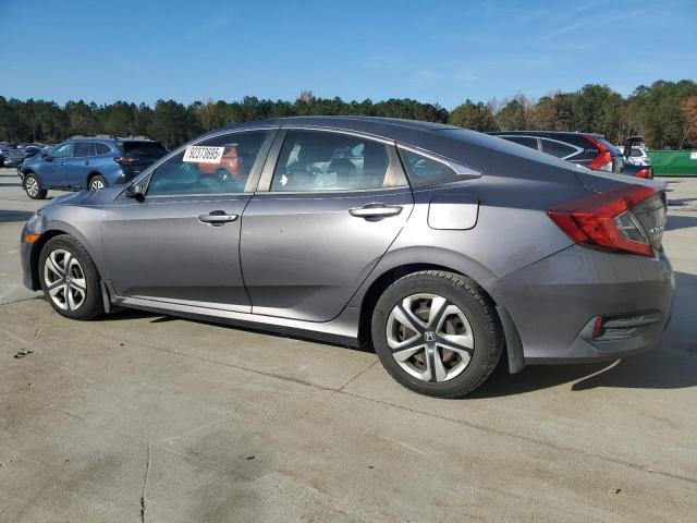 Photo 2 from auction – 2016 HONDA CIVIC LX with VIN 19XFC2F62GE056399