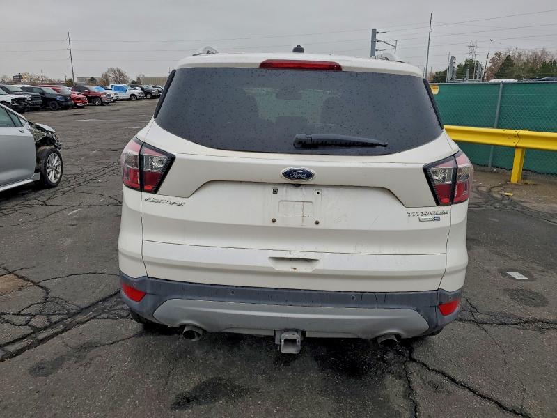 Foto 6 de la subasta – 2017 FORD ESCAPE TIT con VIN 1FMCU9J90HUC50339