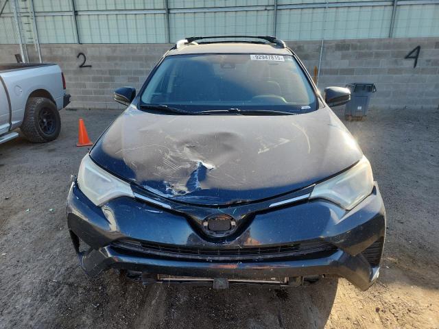 Photo 5 from auction – 2018 TOYOTA RAV4 with VIN JTMBFREVXJJ201237