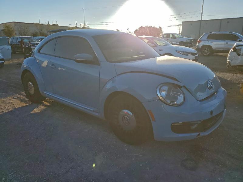 Photo 4 from auction – 2014 VOLKSWAGEN BEETLE with VIN 3VWJP7AT8EM619240