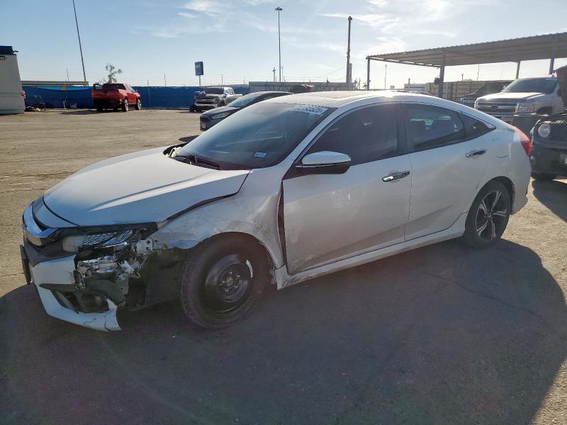 HONDA CIVIC TOUR 2017 with VIN 19XFC1F95HE004948 - Photo from auction