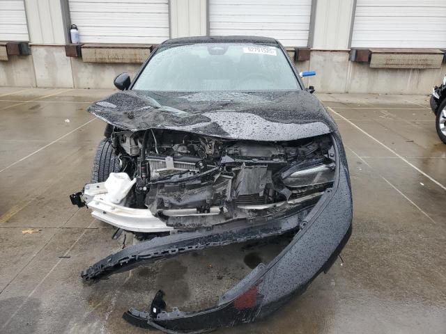 Photo 5 from auction – 2023 HONDA CIVIC SPOR with VIN 2HGFE2F53PH551296