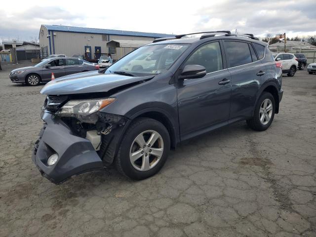 TOYOTA RAV4 XLE 2014 with VIN JTMRFREV5ED092155 - Photo from auction