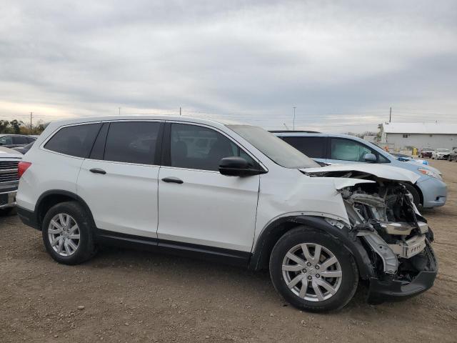 Photo 4 from auction – 2020 HONDA PILOT LX with VIN 5FNYF5H15LB019936