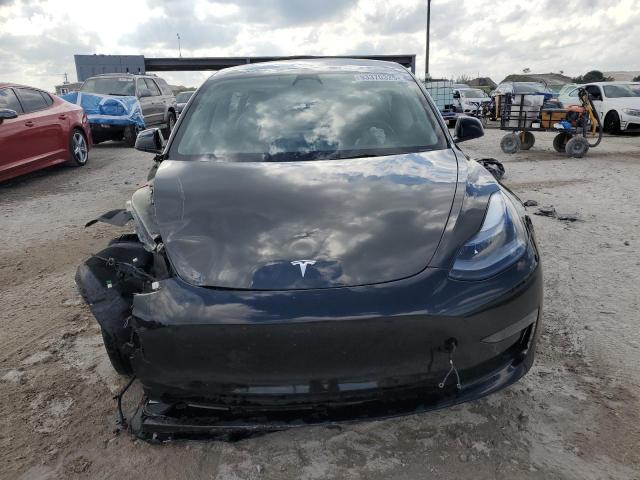 Photo 5 from auction – 2023 TESLA MODEL 3 with VIN 5YJ3E1EA7PF675412