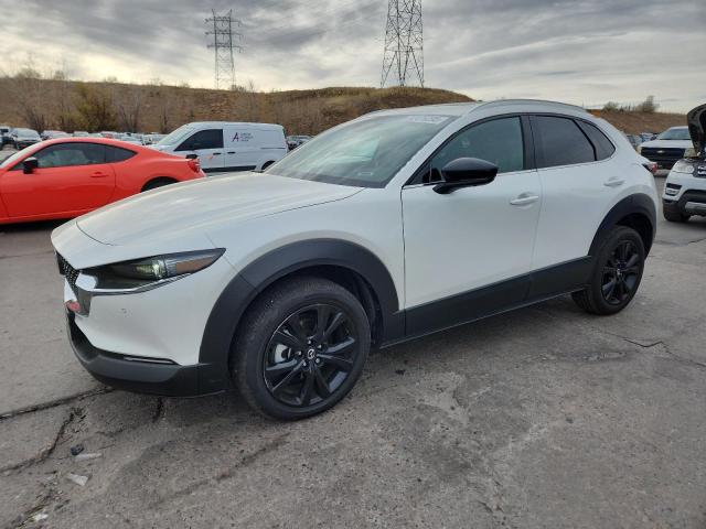 MAZDA CX-30 PREM 2024 with VIN 3MVDMBEY6RM622787 - Photo from auction