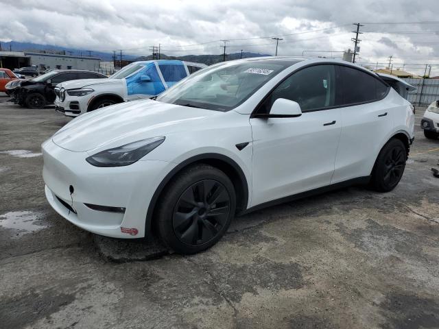 TESLA MODEL Y 2024 with VIN 7SAYGAEE6RF169305 - Photo from auction