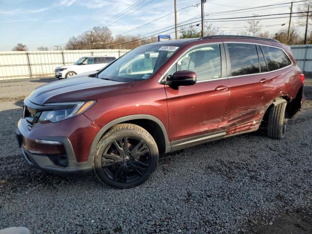 Photo 1 from auction – 2022 HONDA PILOT SE with VIN 5FNYF6H23NB087105