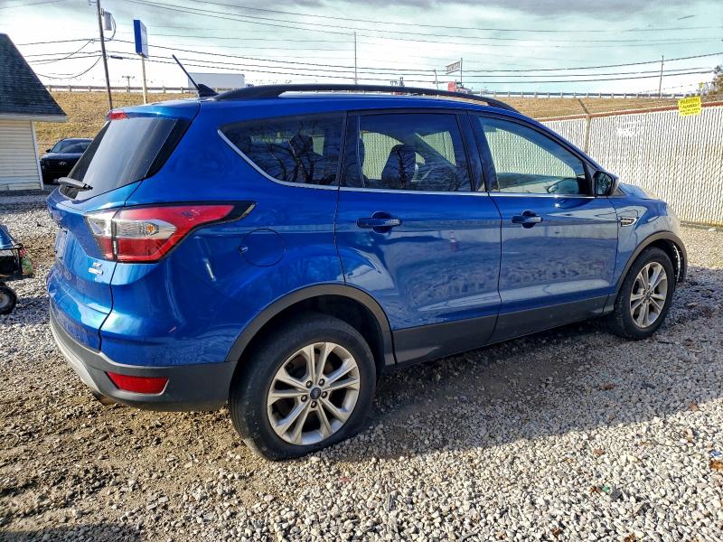 Photo 3 from auction – 2018 FORD ESCAPE SE with VIN 1FMCU9GD6JUA08219