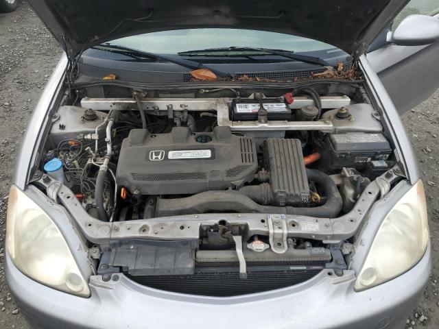 Photo 11 from auction – 2001 HONDA INSIGHT with VIN JHMZE14721T002577