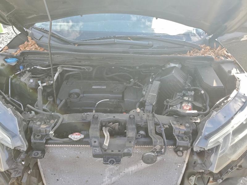 Photo 12 from auction – 2016 HONDA CR-V with VIN 5J6RM4H73GL081485