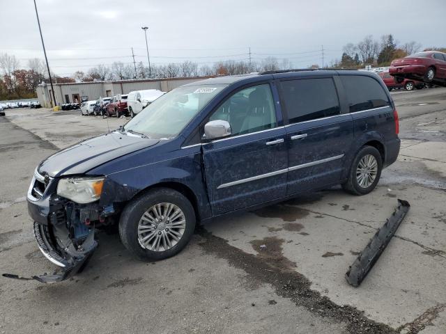 CHRYSLER TOWN & COU 2015 with VIN 2C4RC1CGXFR674734 - Photo from auction