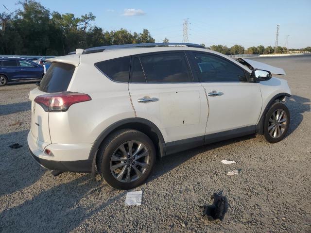 Photo 3 from auction – 2018 TOYOTA RAV4 LIMIT with VIN 2T3YFREVXJW477123