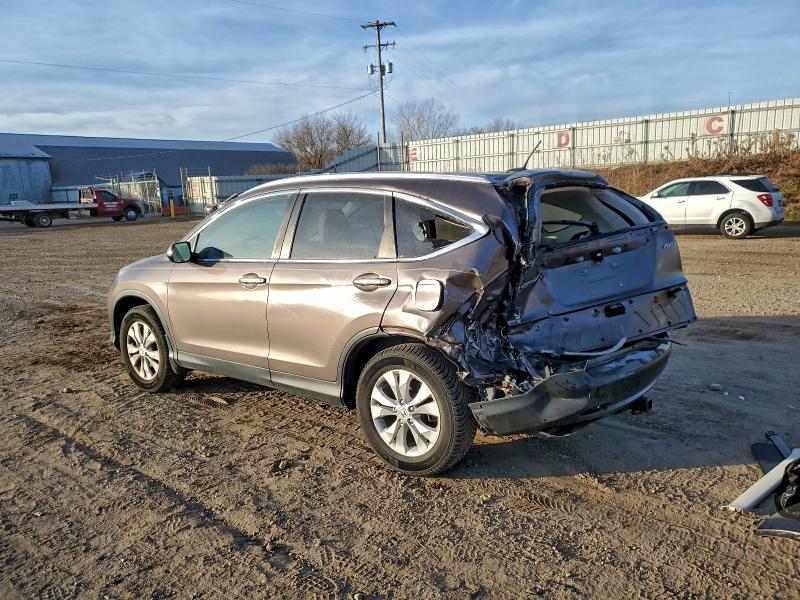 Photo 2 from auction – 2014 HONDA CR-V with VIN 2HKRM4H70EH718629