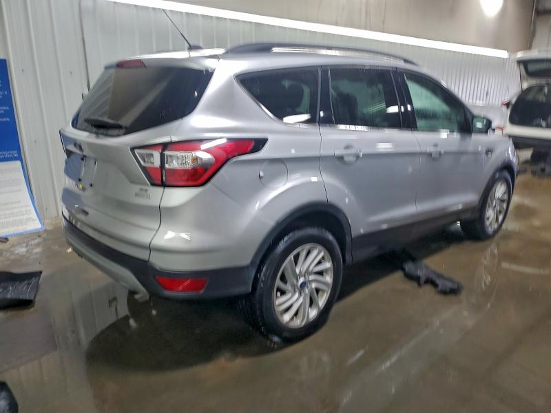 Photo 3 from auction – 2018 FORD ESCAPE SE with VIN 1FMCU0GD9JUA02460