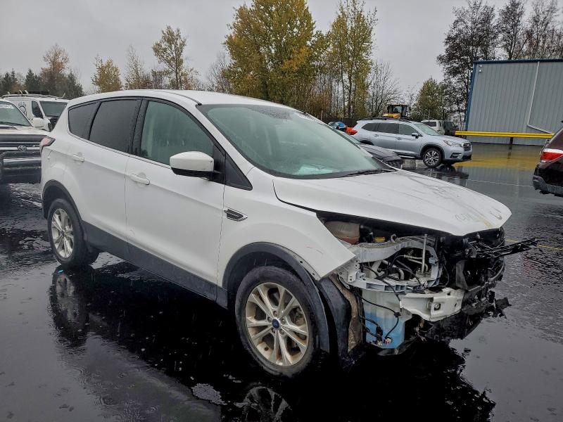 Photo 4 from auction – 2017 FORD ESCAPE SE with VIN 1FMCU9GD4HUD43344