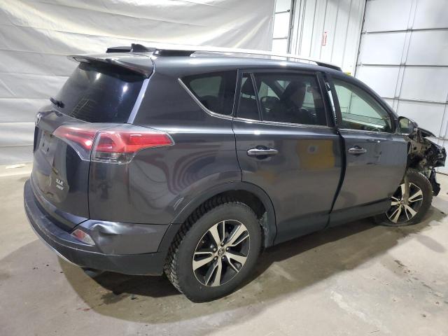 Photo 3 from auction – 2017 TOYOTA RAV4 XLE with VIN JTMRFREV3HD214256