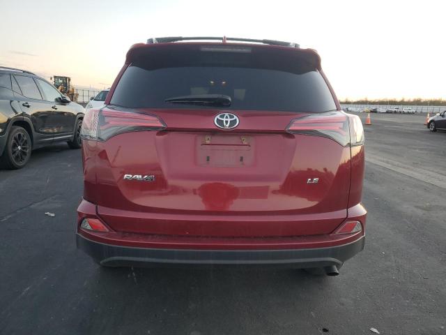 Photo 6 from auction – 2018 TOYOTA RAV4 LE with VIN 2T3ZFREV2JW515397