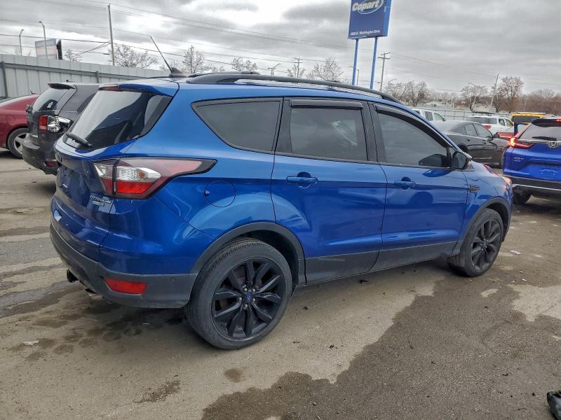 Photo 3 from auction – 2018 FORD ESCAPE TIT with VIN 1FMCU9J99JUB56336