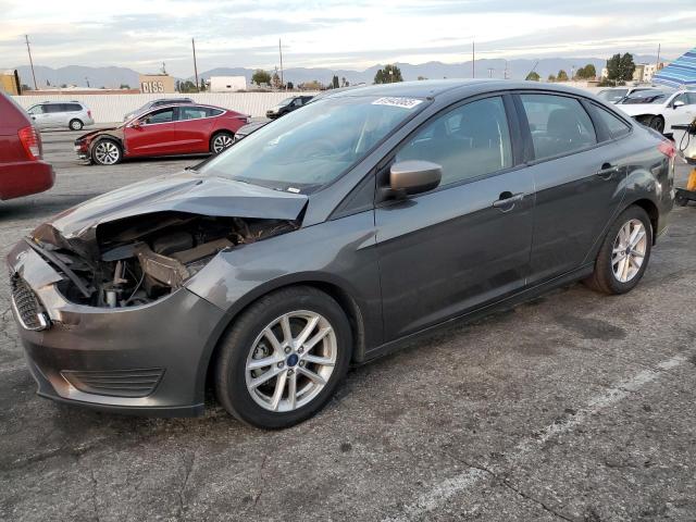 FORD FOCUS SE 2018 with VIN 1FADP3F26JL269228 - Photo from auction