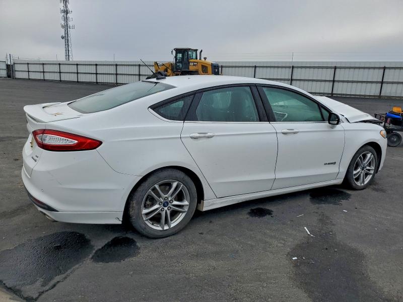 Photo 3 from auction – 2016 FORD FUSION with VIN 3FA6P0LU7GR262845