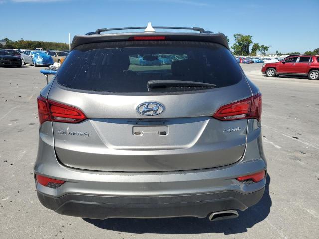 Photo 6 from auction – 2018 HYUNDAI SANTA FE S with VIN 5NMZU3LB4JH088448