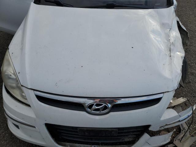 Photo 11 from auction – 2011 HYUNDAI ELANTRA TO with VIN KMHDB8AE1BU090674