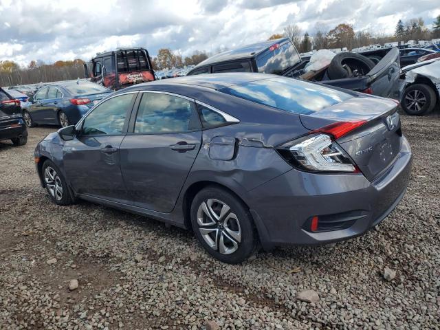 Photo 2 from auction – 2018 HONDA CIVIC LX with VIN 2HGFC2F59JH568083