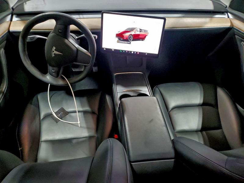 Photo 8 from auction – 2023 TESLA MODEL Y with VIN 7SAYGDEE7PA113174