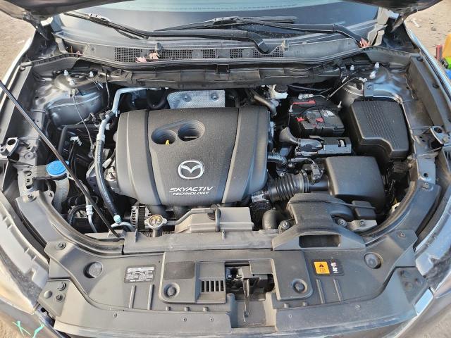 Photo 12 from auction – 2014 MAZDA CX-5 SPORT with VIN JM3KE2BE8E0402412