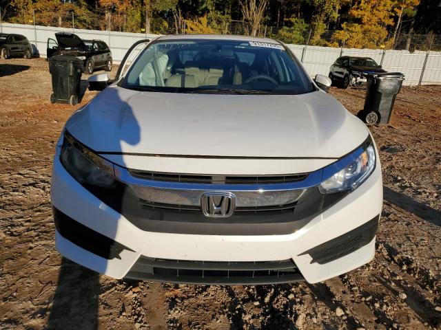 Photo 5 from auction – 2016 HONDA CIVIC EX with VIN 19XFC2F78GE082613