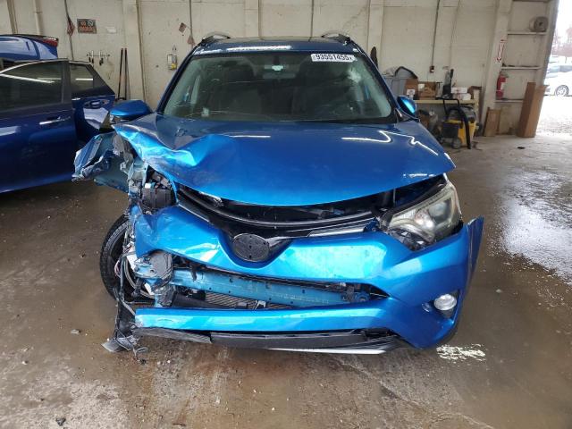 Photo 5 from auction – 2016 TOYOTA RAV4 with VIN JTMWFREV3GJ098690